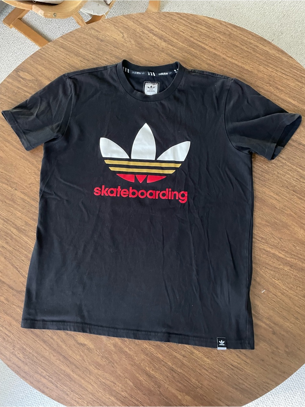adidas Black Short-Sleeve Skateboarding Logo Tee with White, Gold & Red Accents